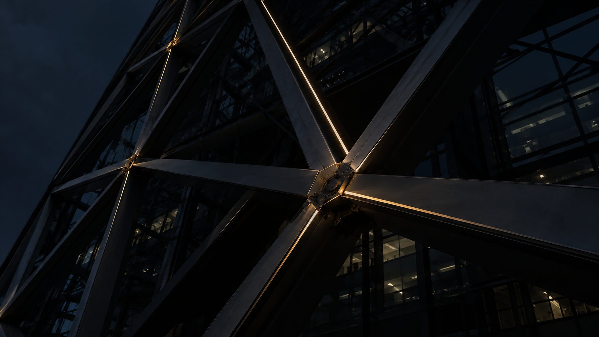 Steel diagrid structure lit at night